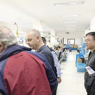 John, CEO of a famous American electrical company, visited our factory